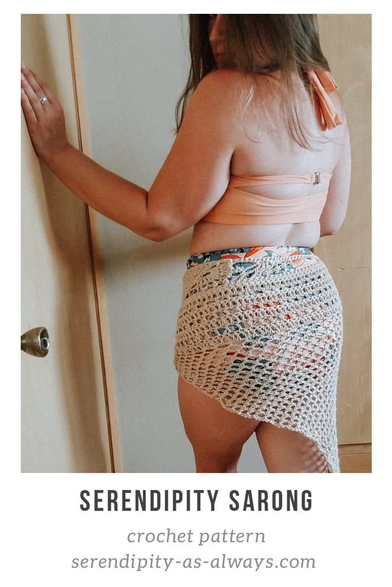 May include: A crocheted sarong in a beige color with a floral pattern. The sarong is tied around the waist and drapes down the legs. The text "SERENDIPITY SARONG" and "crochet pattern" is visible at the bottom of the image. The website address "serendipity-as-always.com" is also visible.