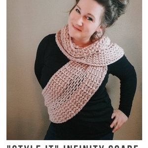 May include: A woman wearing a pink infinity scarf with a crocheted pattern. The scarf is styled in a loose knot around her neck. The text "STYLE IT" INFINITY SCARF crochet pattern  serendipity-as-always.com is visible below the image.