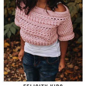 May include: A pink crochet top with a slightly off-the-shoulder design. The top has a simple stitch pattern and short sleeves. The model is wearing the top with a white t-shirt underneath and blue jeans. Felicity Kids crochet pattern serendipity-as-always.com