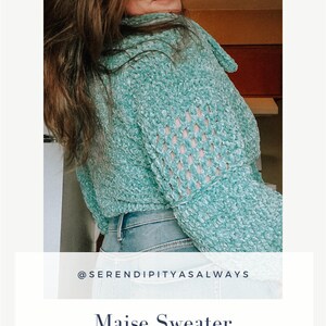 May include: A teal blue crochet sweater with a lacy pattern on the sleeves. The sweater is worn by a person with long brown hair. The text "@serendipityasalways" and "Maise Sweater Crochet Pattern PDF Digital Download" is displayed below the image.