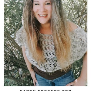 May include: A woman wearing a crocheted top with a brown belt and blue jeans. The top is a light beige color and has a loose, flowing fit. The text "EARTH ESSENCE TOP" and "crochet pattern" is visible below the image. The website address "serendipity-as-always.com" is also visible.