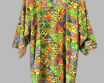 Delantal tipo bata de algodón con estampado abstracto psicodélico estilo mod de la década de 1960, de la marca Design House, talla S/M.