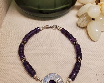 Amethyst/Sterling silver bracelet.  Hand crafted setting. 8 inches long