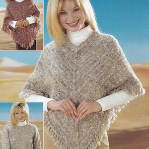May include: A knitted poncho in a neutral color with fringe along the bottom edge. The poncho is worn over a white turtleneck. The image also shows a child wearing a similar poncho and a woman wearing a matching sweater.