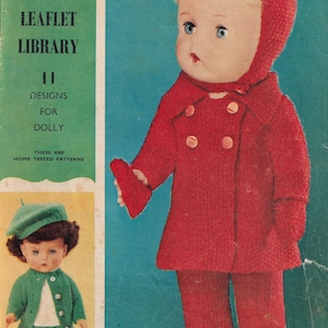 May include: Vintage knitting pattern book cover featuring a doll in a red coat and pants. The cover includes the text "WOMAN'S DAY HANDI-KNIT LEAFLET LIBRARY" and "11 DESIGNS FOR DOLLY". The doll is wearing a red hooded coat and pants.
