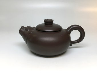 B4102 - Handmade Natural Stone Clay Teapot from Yixing Region of Central China with Tiger head and Yin Yang Design