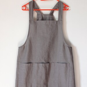 Dungaree dress in Stone coloured linen.