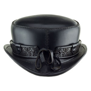 May include: A black leather hat with a patterned band and a black leather bow.