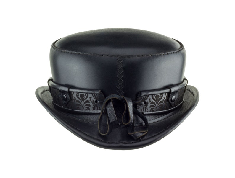 May include: A black leather hat with a patterned band and a black leather bow.