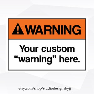 May include: Orange and white warning sign with a black triangle and exclamation point. The text reads "WARNING" in black letters. Below the warning sign is the text "Your custom "warning" here."