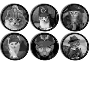May include: Six black and white circular images of cats wearing hats. The cats are wearing a knit cap, a police hat, a fedora, and other hats. The images are framed in black.