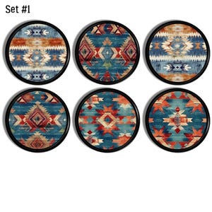 May include: Set of six round coasters with a black border. Each coaster features a Southwestern-inspired geometric pattern in shades of blue, orange, and cream. The coasters are designed to protect surfaces from drink rings.