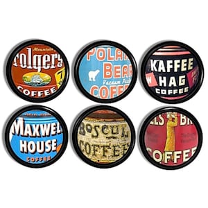 May include: Six vintage coffee can labels in black circular frames. The labels feature different brands, including Folgers, Polar Bear, Kaffee Hag, Maxwell House, Boscul, and a brand with a woman in a yellow dress.