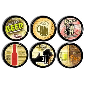 May include: Set of six round coasters with black borders. Each coaster features beer-themed designs, including text like "Just Add Beer" and "It's Your Friend!" with vintage-style illustrations of beer mugs and bottles.