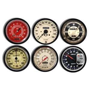 May include: Six vintage-style car gauges with black bezels and white faces. The gauges measure speed in kilometers per hour, miles per hour, and revolutions per minute. The gauges have black needles and white numbers.