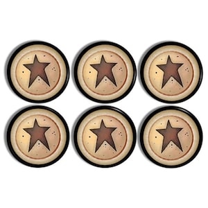 May include: Six round, decorative magnets with a rustic star design. Each magnet features a brown star on a beige background, framed by a black border. The magnets are arranged in two rows of three.