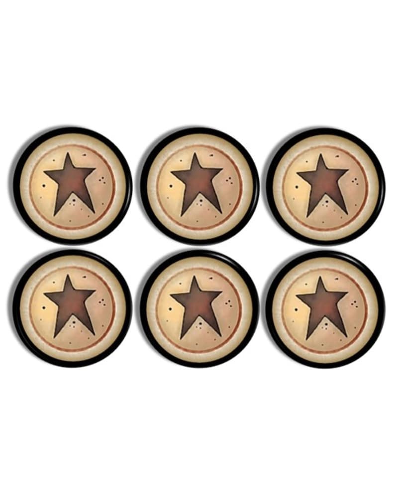 May include: A set of six circular buttons, each featuring a dark brown five-pointed star centred on a light tan background. The buttons are framed by a thin, dark brown circular border and a thick black outer rim, with small dark speckles.
