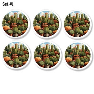 May include: Set of six white, round coasters featuring a detailed illustration of a desert cactus garden. The artwork includes various cacti, succulents, and orange-brown plants under a blue sky. The text "Set #1" is in the upper left corner.