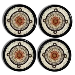 May include: Set of four round coasters with a black border. Each coaster features a vintage-style illustration of a sun with a face at the center, surrounded by a circular design with text. The coasters are designed to protect surfaces from drink rings.