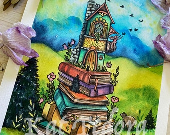May include: A watercolour painting depicting a whimsical house constructed on a stack of colourful books. The house features a green roof, a stone chimney, and a balcony with a woman gazing out. The books are surrounded by flowers and a small woodland. The painting is signed "K.FEDORA" in the bottom right corner.