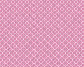May include: Pink fabric with a white floral pattern. The fabric has a repeating pattern of small white flowers on a pink background.