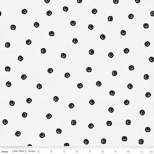 May include: White fabric with a repeating pattern of black jack-o'-lantern faces.