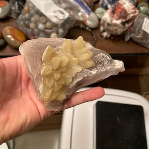 Dogtooth calcite on fluorite