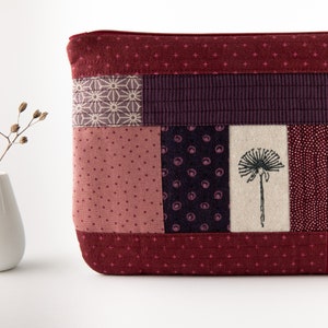 EINZELSTÜCK: Täschchen • Patchwork • Pusteblume • rot • lila • Kosmetiktasche • Stoff • Muster • Quilt