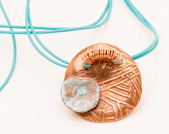 Textured Circular Pendant with Copper Wire and Turquoise Leather Cord
