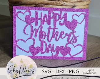 May include: A pink glitter card with a white background and the text "HAPPY Mother's DAY" in a pink glitter font. The card is decorated with pink glitter hearts.