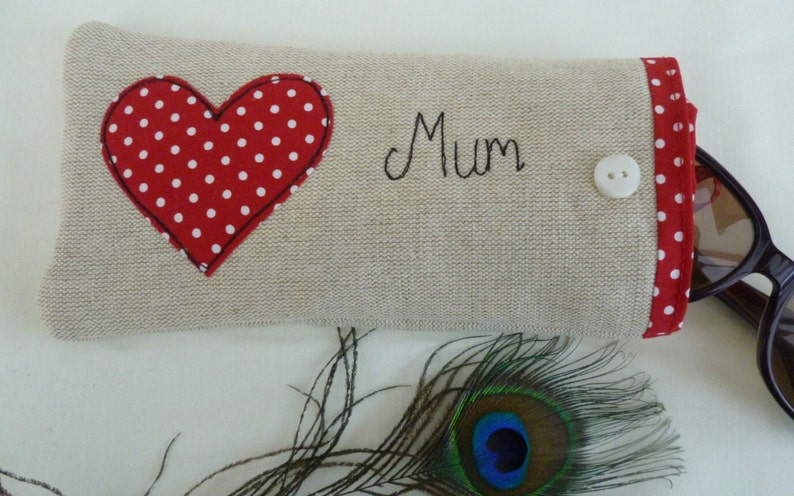 Personalised heart applique glasses case.  Spectacles or sunglasses pouch with choice of red dot or pink floral heart on linen or grey wool. coordinating ribbon and button fastening.  unique handmade customisable anniversary valentines gift