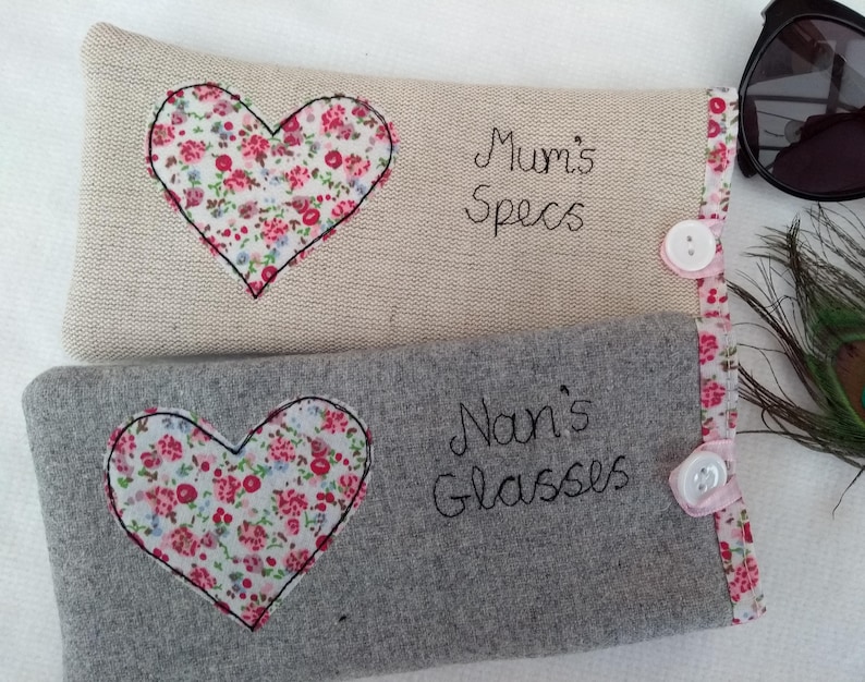 Personalised heart applique glasses case.  Spectacles or sunglasses pouch with choice of red dot or pink floral heart on linen or grey wool. coordinating ribbon and button fastening.  unique handmade customisable anniversary valentines gift