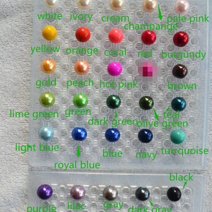 May include: A chart of 24 pearl beads in various colours, including white, ivory, cream, pale pink, yellow, orange, coral, red, burgundy, gold, peach, hot pink, lime green, green, dark green, olive green, teal, light blue, royal blue, blue, navy, turquoise, black, purple, lilac, grey, and dark grey.