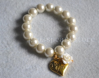 Braccialetto Flower Girl, perle di vetro e fiore in resina, ciondolo a forma di cuore dorato