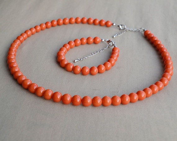 womens orange pearl