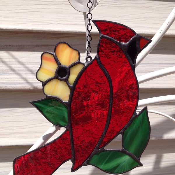 Red cardinal with yellow orange flower stained glass suncatcher