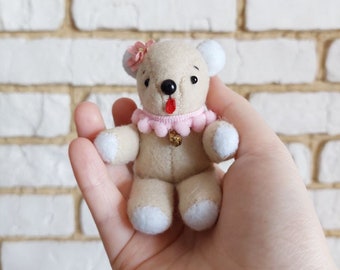 Handmade beige and white stuffed animal teddy bear.  Felt soft toy. Gift for birthday. Retro teddy bear.