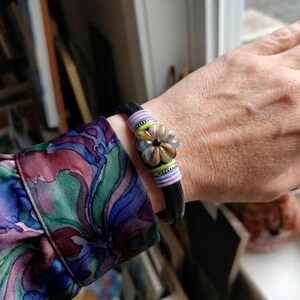 Flower glass lampwork bead - black leather bracelet - magnetic clasp