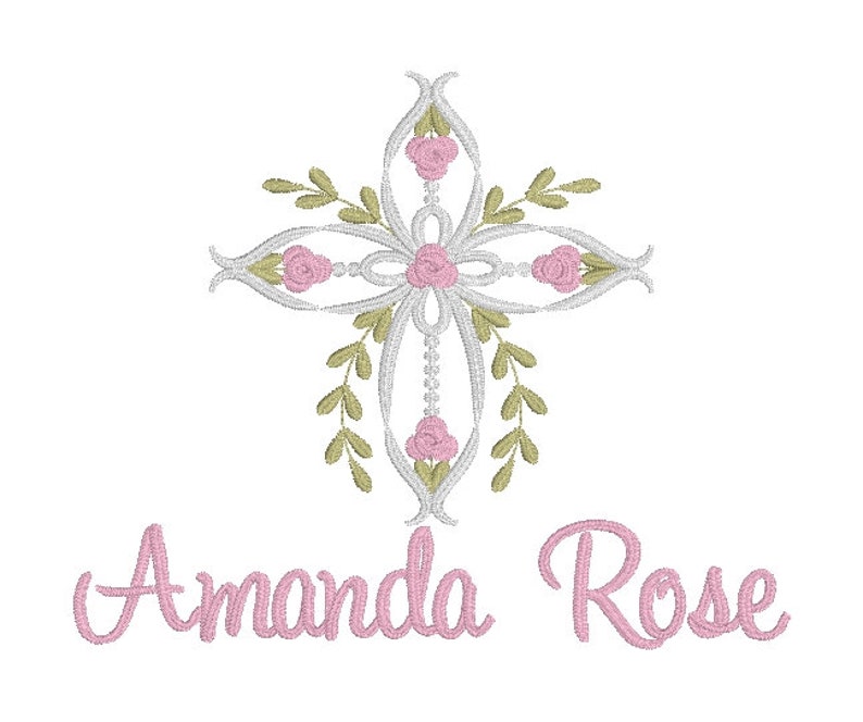 May include: Embroidered design featuring a white cross with pink roses and green leaves. The name "Amanda Rose" is written in pink cursive below the cross.