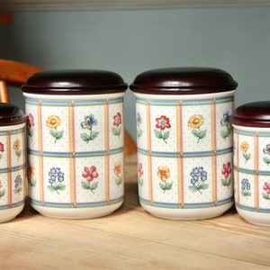 Four very pretty Villeroy & Boch canisters with wooden lids, in the &#39;Julie&#39; design.
