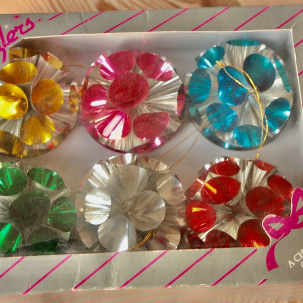 A boxed set of six foil 'Dazzlers' for the tree.