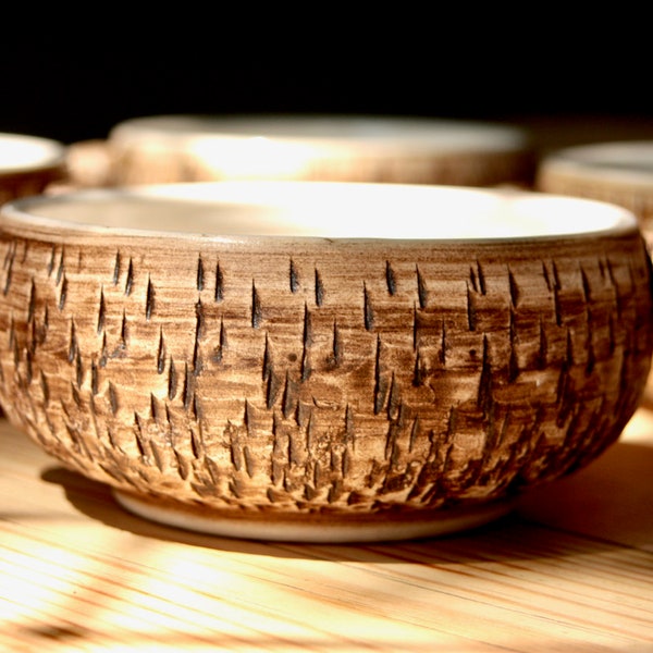 Four studio pottery dishes made by Bristow Chillington of Devon.