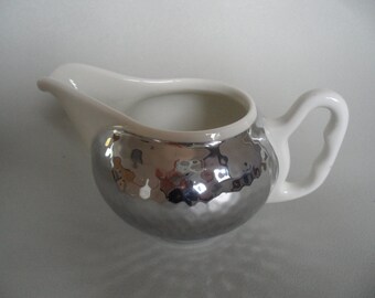 Creamer,Vintage creamer,old creamer,porcelain creamer,creamer and cover,milk jug,cream jug,creamer with isolation,porcelain milk jug