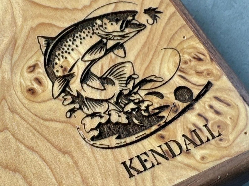 Personalized option. Name or initials are engraved under image