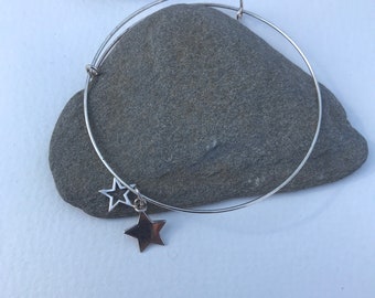 Silver bangle with stars