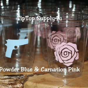 May include: Clear plastic cups with blue gun and pink rose designs. The cups are labeled "TipTop Supply4u" and "Powder Blue & Carnation Pink".