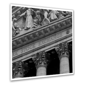 May include: Black and white photograph of the New York Stock Exchange building with the words "New York Stock Exchange" carved into the stone.