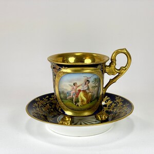 Antique Cup/Saucer With Golden Legs & Love Scene — Amor Entwoffnet