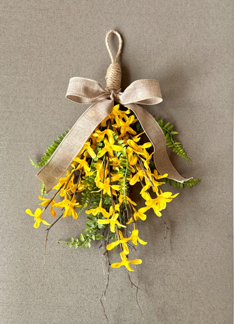 Worth Imports 34 in. Forsythia Twig Swag Wreath, Yellows/Golds Price Tracking