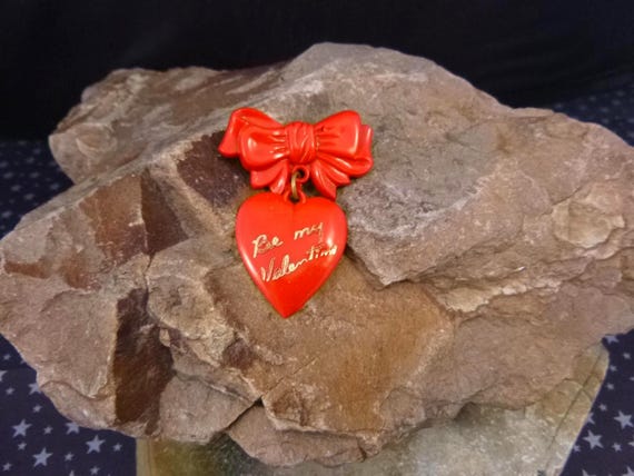 Bow and Heart Vintage 1950s Celluloid Be My Valentine Pin | Red Valentine Heart Dangling from Bow |  Mid Century Red Heart Pin | Book Piece